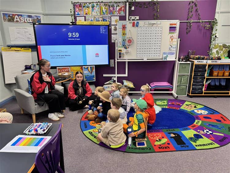 Teachers and children in classroom