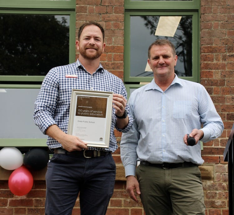 Principal and council member at celebration